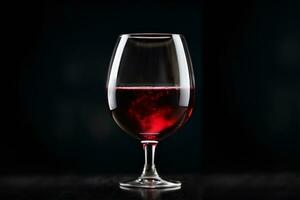 rouge du vin dans du vin verre sur noir Contexte. commercial promotionnel photo. ai génératif photo