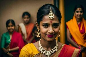 une femme dans une sari pose pour le caméra. généré par ai photo