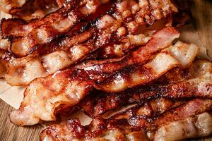 bandes de parfumé frit bacon. macro Contexte. photo