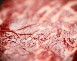 brut steak. macro Contexte. le texture de le Viande. photo