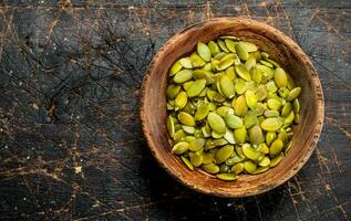 citrouille des graines dans bol . photo