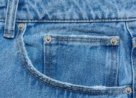 bleu jeans de face poche avec boutons, proche en haut photo