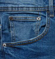 bleu jeans de face poche avec boutons, proche en haut photo