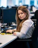 une femme séance à une bureau génératif ai photo