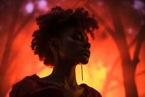 un africain américain femme dans rouge permanent dans de face de une Feu génératif ai photo