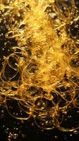 une proche en haut vue de une bouquet de or liquide sur une noir surface génératif ai photo