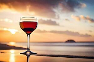 une verre de du vin sur le plage à le coucher du soleil. généré par ai photo