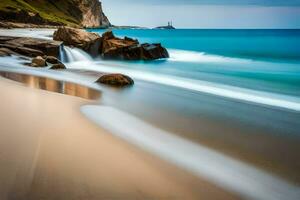 une longue exposition photographier de une plage avec rochers et l'eau. généré par ai photo