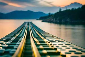 une train Piste est vu dans le distance à le coucher du soleil. généré par ai photo