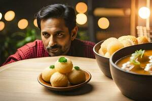 une homme est assis à une table avec deux boules de aliments. généré par ai photo