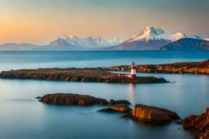 une phare est assis sur le rive de une corps de l'eau avec montagnes dans le Contexte. généré par ai photo