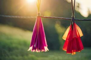 deux coloré pompons pendaison de une fil. généré par ai photo