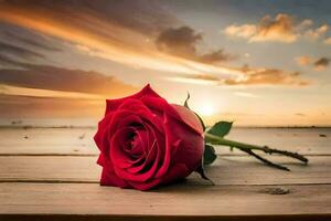 une Célibataire rouge Rose est assis sur une en bois table dans de face de une le coucher du soleil. généré par ai photo