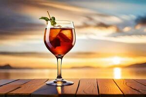 une verre de du vin sur une en bois table avec le coucher du soleil dans le Contexte. généré par ai photo