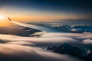 un avion aile en volant plus de des nuages à le coucher du soleil. généré par ai photo