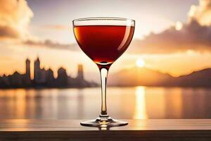 une verre de rouge du vin sur une table dans de face de une ville ligne d'horizon. généré par ai photo