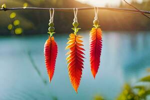 Trois coloré feuilles pendaison de une branche. généré par ai photo