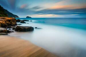 une longue exposition photographier de une plage à le coucher du soleil. généré par ai photo