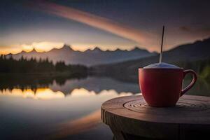 une rouge tasse de café est assis sur une en bois table surplombant une lac. généré par ai photo