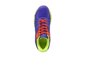 baskets violet avec vert et Orange accents sur une blanc Contexte. sport des chaussures photo