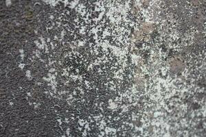 grungy ciment mur arrière-plan, vieilli le sable mur surface, patiné rustique mur toile de fond photo