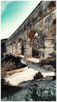 ensoleillé journée à pont du gard scénique vues romain architecture photo