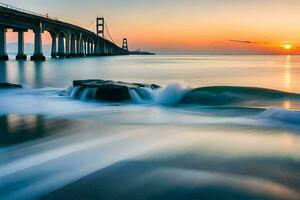 le d'or porte pont, vagues, eau, océan, lever du soleil, HD fond d'écran. généré par ai photo