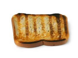 pain grillé avec beurre sur blanc Contexte. photo