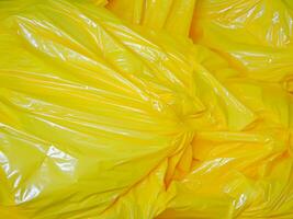 Jaune Plastique sac. texture. Contexte. photo