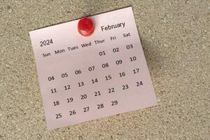 février 2024 calendrier sur gluant note. rappel et 2024 Nouveau année concept photo