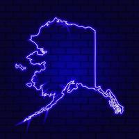Enseigne au néon lumineux de l'Alaska sur fond de mur de brique photo