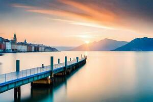 une jetée dans le l'eau à le coucher du soleil avec montagnes dans le Contexte. généré par ai photo