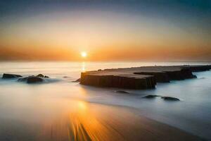 une longue exposition photographier de une le coucher du soleil sur le plage. généré par ai photo