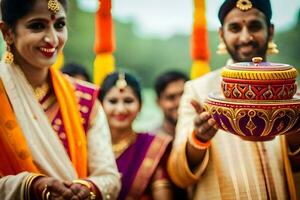 une homme et femme dans traditionnel Indien tenue sont en portant une pot. généré par ai photo