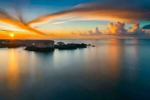 une le coucher du soleil plus de le océan avec des nuages et rochers. généré par ai photo