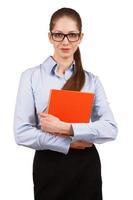 femme élégante avec un journal orange à la main photo