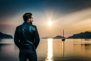 une homme dans une cuir veste des stands par le l'eau à le coucher du soleil. généré par ai photo