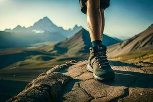 une la personne portant randonnée des chaussures permanent sur une Roche dans le montagnes. généré par ai photo