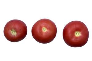 Trois juteux rouge tomates sur une blanc Contexte. photo