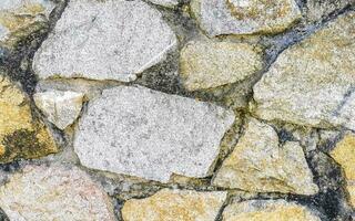 texture détail de mur avec rochers des pierres brique briques Mexique. photo