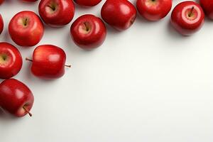 Frais rouge pommes sur blanc arrière-plan, Haut voir. espace pour texte ai généré photo