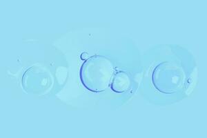 gouttes de transparent gel avec air bulles sur une bleu Contexte photo