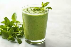 rafraîchissant vert smoothie avec Frais menthe feuilles sur blanc marbre plan de travail - santé et bien-être encore la vie - ai généré photo