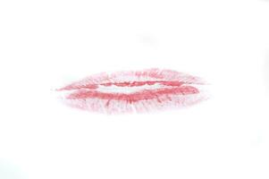 rouge baiser sur blanc photo