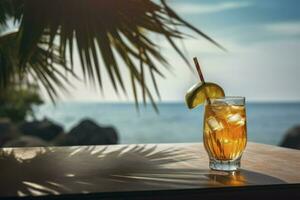 coloré cocktail ou jus dans une verre décoré sur une en bois table sur flou paysage marin Contexte. ai généré photo