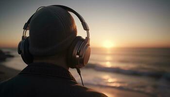 un homme écoute à écouteurs, profiter le le coucher du soleil en plein air généré par ai photo