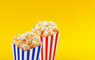 verre avec pop corn sur une Jaune Contexte photo