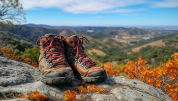 Jaune randonnée bottes conquérir Montagne de pointe dans l'automne généré par ai photo