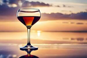 une verre de du vin sur le plage à le coucher du soleil. généré par ai photo