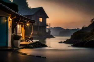 une maison est assis sur le rive de une Lac à le coucher du soleil. généré par ai photo